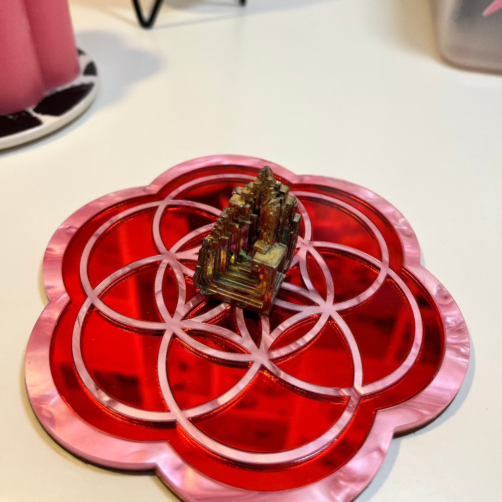 red and pink mirror seed of life shaped board for crystal displays