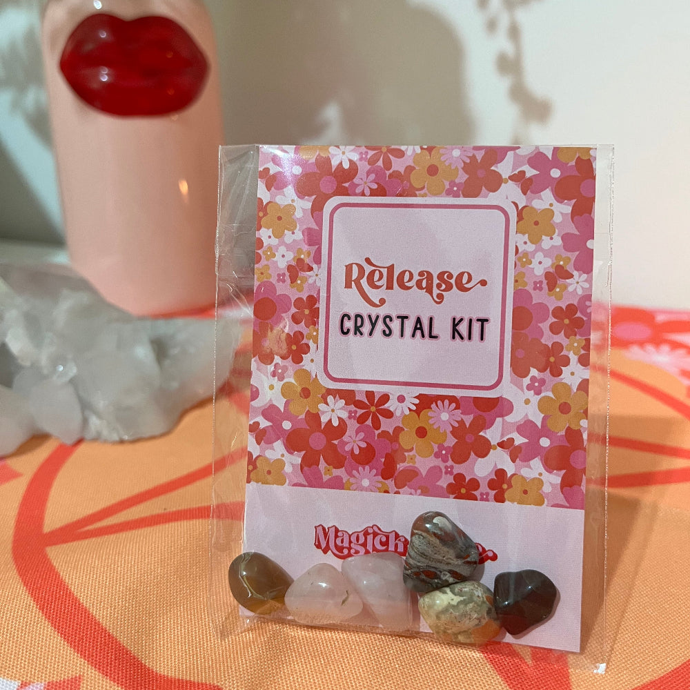 Release the past Crystal kit with colorful packaging on a floral background